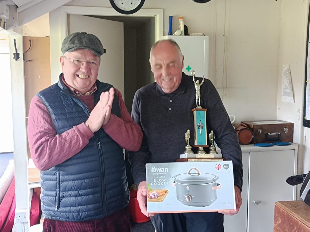 Geoff Blamire presenting John Medcalf with his winner's prize